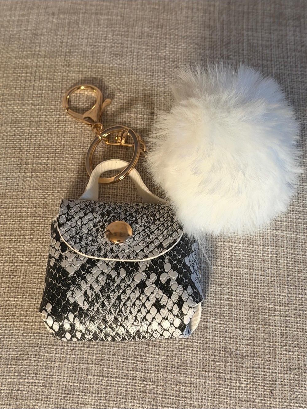 Faux Snakeskin Mini Bag Keychain with Cream Pom Pom